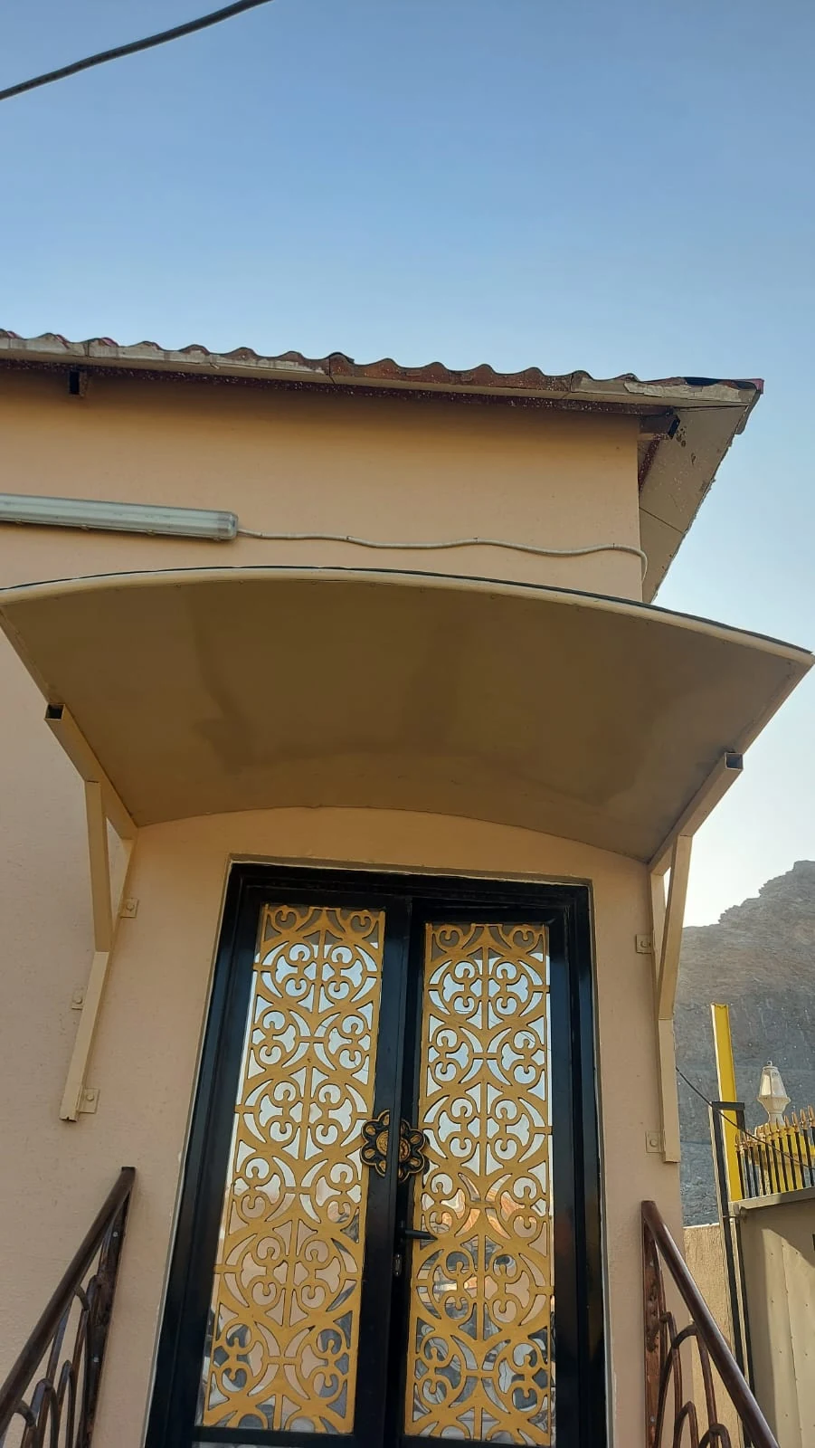 Glass and metal arched entrance