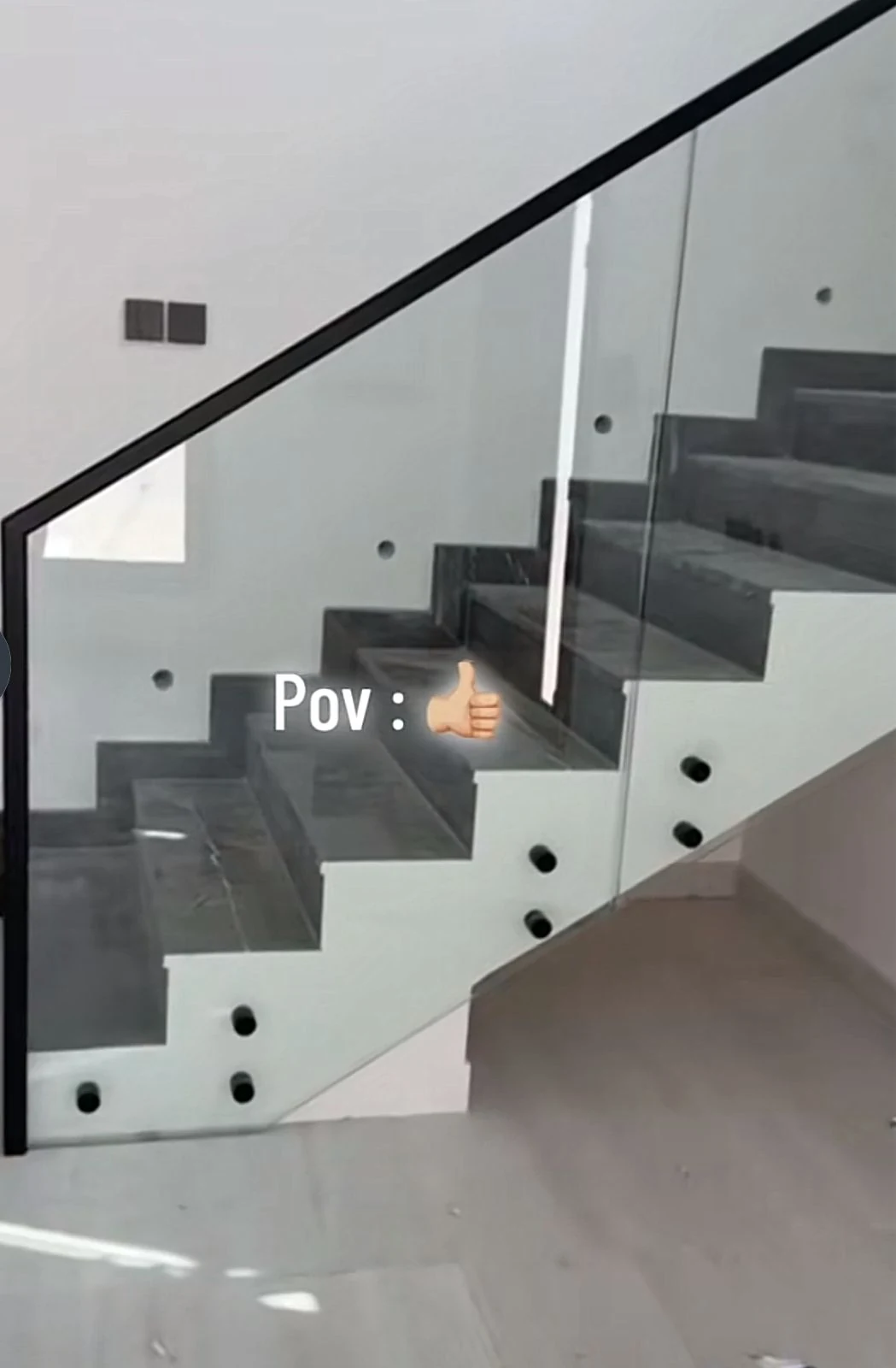 Glass balustrade beside a staircase