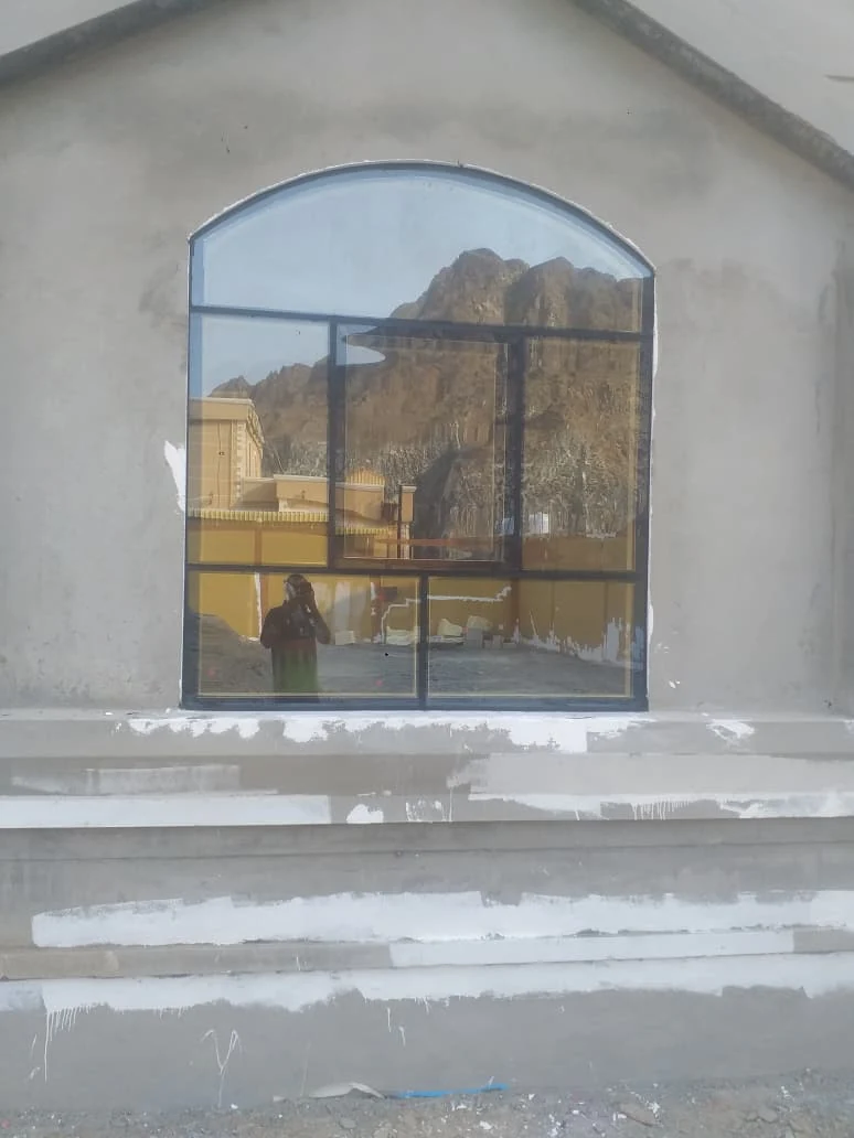 Arched window and glazing