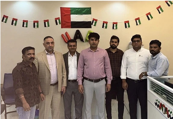 Al Zumorud office team