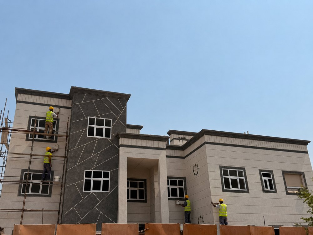 Villa facade in washed marble chips — Al Shamkha, Abu Dhabi