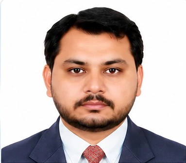 Portrait of Muhammad Qamar Iqbal in formal attire